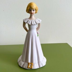 Enesco growing up porcelain doll aged 13